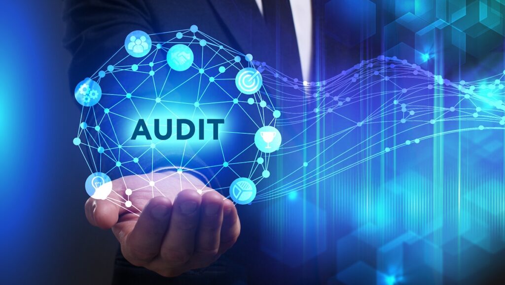 Hand holding audit label